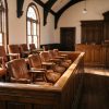 Empty wooden jury box in a traditional Texas courtroom